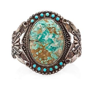 A Collection of Southwestern Style Turquoise Cuff Bracelets, 61.40 dwts.