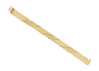 * A 14 Karat Yellow Gold Brick Link Bracelet, 20.00 dwts.