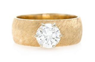 A 14 Karat Yellow Gold and Diamond Solitaire Ring, 4.50 dwts.
