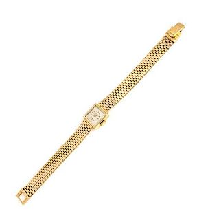 A 14 Karat Yellow Gold Wristwatch, Tourneau, 17.50 dwts.