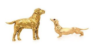 * A Collecion of 14 Karat Yellow Gold Dog Brooches, 13.70 dwts.