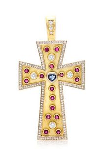 * An 18 Karat Yellow Gold, Diamond, Sapphire and Ruby Cross Pendant, 34.00 dwts.