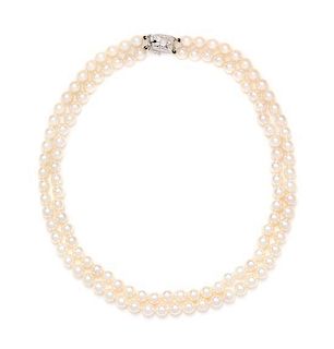 * An 18 Karat White Gold and Double Strand Cultured Pearl Necklace, Mikimoto, 41.70 dwts.