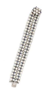 * A White Gold, Sapphire, Diamond and Cultured Pearl Bracelet, 31.50 dwts.