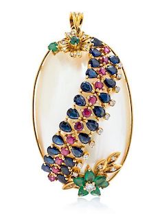 * An 18 Karat Yellow Gold, Mabe Pearl, Diamond, Emerald, Ruby and Sapphire Pendant, 13.80 dwts.
