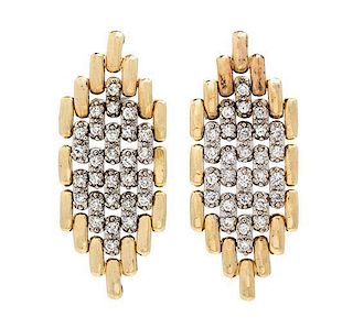 * A Pair of Bicolor Gold and Diamond Earclips, 8.50 dwts.