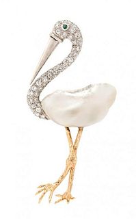 * A Platinum, Yellow Gold, Diamond, Blister Pearl and Emerald Stork Brooch, 11.00 dwts.