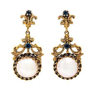 A Pair of 14 Karat Yellow Gold, Mabe Pearl and Sapphire Earrings, 7.30 dwts.