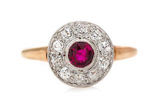 A Platinum Topped Rose Gold, Ruby and Diamond Ring, 1.80 dwts.