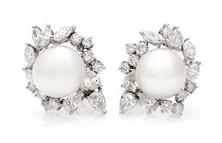 * A Pair of Platinum, Diamond and South Sea Pearl Earclips, 16.80 dwts.