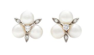 * A Pair of White Gold, Cultured Pearl and Diamond Earclips, 6.60 dwts.