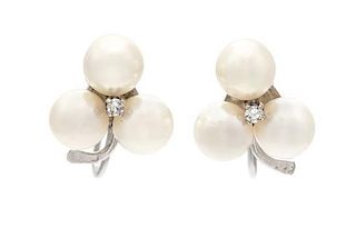 * A Pair of White Gold, Cultured Pearl and Diamond Screwback Earrings, 3.10 dwts.
