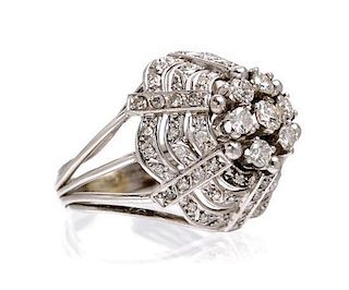 A Platinum and Diamond Bombe Ring, 5.80 dwts.