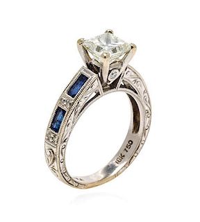 An 18 Karat White Gold, Diamond and Sapphire Charlotte Ring, Kirk Kara, 3.10 dwts.