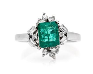 A 14 White Gold, Emerald and Diamond Ring, 2.30 dwts.