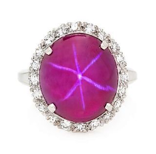 A 14 Karat White Gold, Synthetic Star Ruby and Diamond Ring, 4.60 dwts.