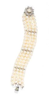 * A 14 Karat White Gold, Diamond and Cultured Pearl Multistrand Bracelet,