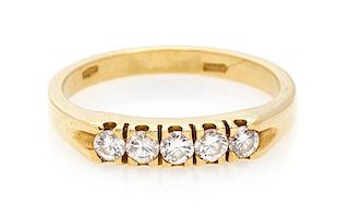An 18 Karat Yellow Gold and Diamond Band Ring, 2.30 dwts.