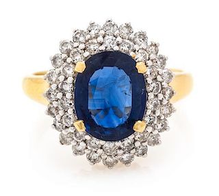 An 18 Karat Yellow Gold, Sapphire and Diamond Ring, 3.80 dwts.