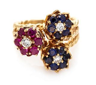 A Yellow Gold, Sapphire, Ruby and Diamond Flower Motif Ring, 7.40 dwts.