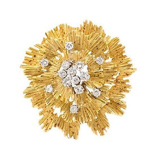 * An 18 Karat Yellow Gold and Diamond Pendant/Brooch, 13.90 dwts.