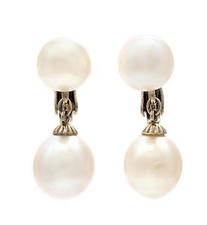 * A Pair of 14 Karat White Gold and Cultured Pearl Earclips, 3.80 dwts.