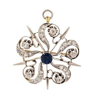 An Edwardian Platinum Topped Gold, Diamond and Sapphire Pendant/Brooch, 7.80 dwts.