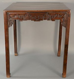 Qing Dynasty game table having square top over scroll carved apron and four small drawers, 19th century or earlier.  ht. 33 1/2 in.; top: 30 1/4" x 3