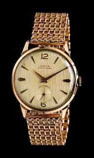 * An 18 Karat Rose Gold Antimagnetic Wristwatch, Index,