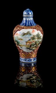A Blue and White and Polychrome Enameled Porcelain Snuff Bottle Height 1 1/2 inches.