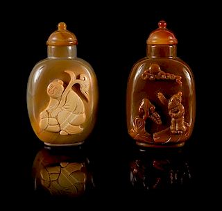 Two Carved Agate Snuff Bottles Height of taller 3 inches.
