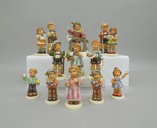 (11) Hummel Porcelain Figures with Crystal Ornaments.