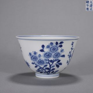 A blue and white flower and dragon porcelain cup