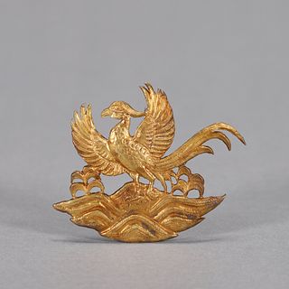 A gold phoenix bird hat ornament