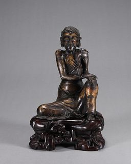 A gilding copper sadhu statuette