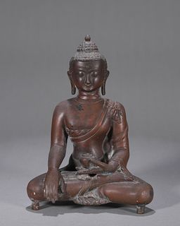 A copper Sakyamuni statue