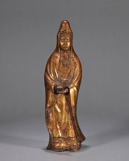 A gilt copper Guanyin statue