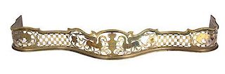 A French Etched and Pierced Cut Brass Fire Fender Height 8 x length 53 1/2 inches.