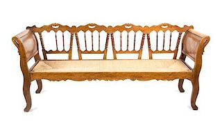 A French Provincial Fruitwood Bench Height 34 1/2 x width 76 1/2 x depth 19 1/2 inches.