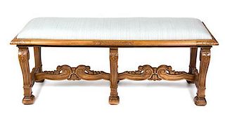 A Louis XVI Style Carved Walnut Bench Height 20 x width 47 1/2 x depth 17 inches.