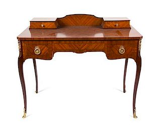 A Louis XVI Style Gilt Metal Mounted Lady's Writing Desk Height 34 3/4 x width 41 x depth 21 1/4 inches.