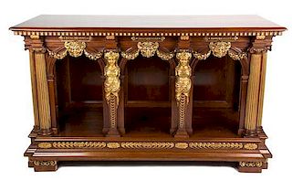 A Continental Empire Style Mahogany and Carved Giltwood Console Table Height 39 x width 66 x depth 27 inches.