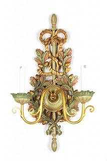 An Italian Carved and Painted Giltwood Two-Light Wall Sconce Height 25 inches.