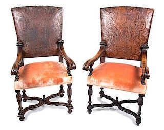 A Pair of Renaissance Revival Style Mahogany Open Armchairs Height 50 x width 25 x depth 24 inches.