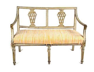 A Gustavian Painted and Parcel Gilt Settee Height 33 1/2 x width 42 x depth 21 1/2 inches.