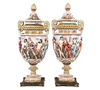 A Pair of Capo-di-Monte Porcelain Covered Urns Height 16 3/4 inches.