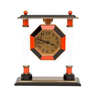 A French Enameled Table Clock Height 5 inches.
