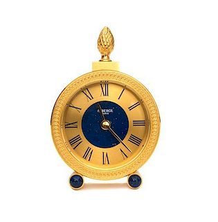 A Contemporary Fabergé Brass Desk Clock Height 5 1/8 inches.