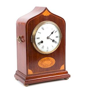 An English Inlaid Mahogany Lancet Clock Height 13 1/2 x width 9 1/4 x depth 5 inches.