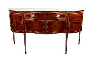 A Hepplewhite Inlaid Mahogany Sideboard Height 37 x width 67 1/2 x depth 25 1/2 inches.